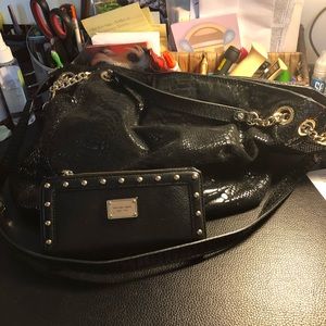 Black leather Micheal Kors purse and wallet